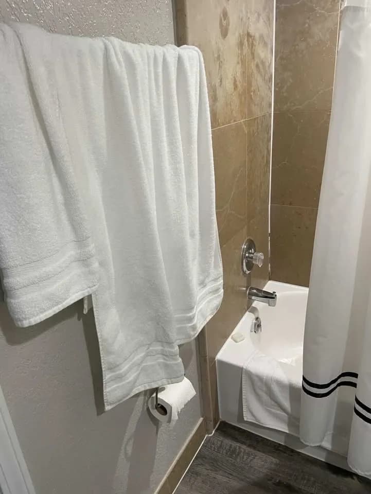 Fresh towels staged in Jacksonville Airbnb bathroom